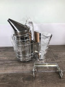 lot 409 image: Stainless steel bee hive smoker