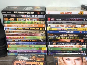 lot 437 image: 76 DVD Movies with 5 Cases Full of DVDs