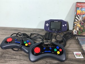 lot 447 image: Video Games, Console and Controllers