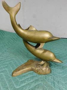 lot 279 image: Brass dolphin