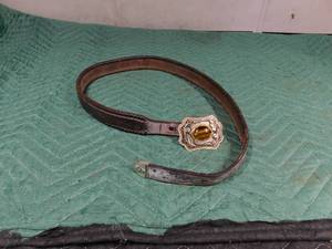 lot 281 image: Leather belt with stone in belt buckle