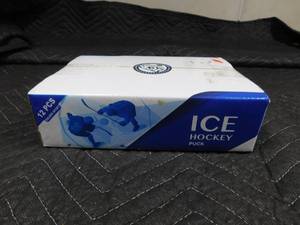lot 302 image: Brand new box of 12 hockey pucks