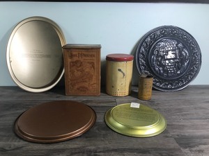 lot 487 image: Lot of Collector Metal Plates and more