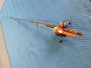 lot 336 image: 2 fishing rods and reels and 1 childs fishing rod and reel