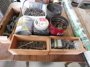 lot 374 image: Drill hole bits, cans of nails and screws and more