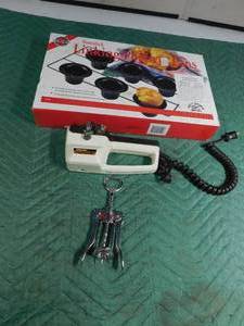lot 376 image: Linking pop over pans, electric can opener and corkscrew