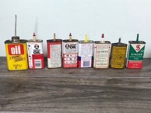 lot 543 image: 8 - Vintage oil lubricant cans