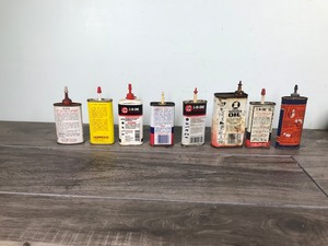 lot 544 image: 8 - Vintage oil lubricant cans