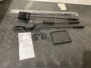 lot 102 image: FEED GARDEN 4-Piece 27 Inch Black Wrought Iron Fireplace Tools Set