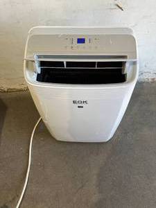 lot 95 image: Emerson Quiet Kool 14000 BTU ASHRAE10000 BTU DOE 115V Portable White Air Conditioner with Dehumidifier and Remote Control
