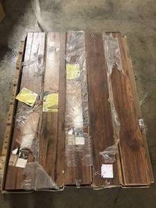 lot 23 image: 5 Boxes of Home Decorators Collection Distressed Brown Hickory 12 mm T x 6.3 in. W Laminate Wood Flooring (15.5 sqftcase) Customer Returns See Pictures