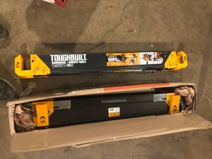 lot 31 image: TOUGHBUILT 39.9 to 45.9W x 25 to 32H C700 Adjustable Sawhorse and Jobsite Table with 1300 lb capacity  Customer Returns See Pictures