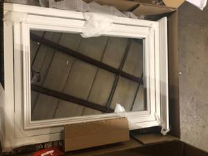 lot 45 image: Home Decorators Collection Fremont 24 in. W x 30 in. H Framed Rectangular Bathroom Vanity Mirror in White  Customer Returns See Pictures