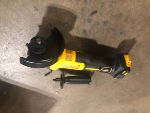 lot 46 image: DEWALT 20V Cordless 5 in. Variable Speed Angle Grinder with FLEXVOLT Advantage     Customer Returns See Pictures