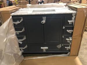 lot 50 image: Home Decorators Collection Merryfield 49 in. W x 22 in. D x 35 in. H Freestanding Bath Vanity in Dark Blue-Gray with Carrara White Marble Top Customer Returns See Pictures