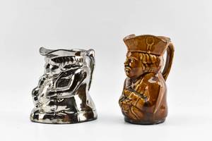 lot 45 image: Two Antique Toby Mugs - Silver Luster and Bennington Rockingham