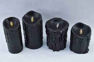 lot 274 image: Four Black Moving Flame Flameless Real Wax Candles with Wax Drip Details Luminara, Ot