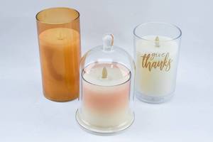lot 275 image: Three White Moving Flame Flameless Real Wax Candles in Glass Containers, Luminara, Other