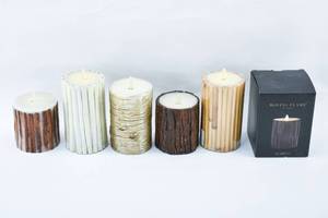 lot 278 image: Six Moving Flame Flameless Candles With Bark and Cinnamon Inlay Luminara, Liown, Matchless