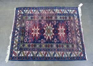 lot 198 image: Persian-Style Red and Blue Rug