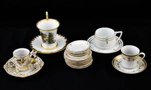 lot 61 image: Group of Four Assorted Embellished Teacups and Saucers