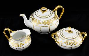 lot 181 image: Three-Piece Jean Pouyat Limoges Porcelain Tea Set