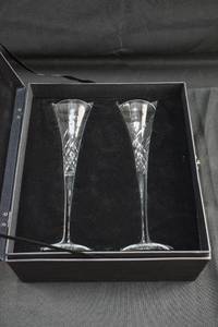 lot 141 image: Pair of Happy Celebrations Champagne Flutes by Waterford Crystal
