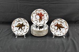 lot 232 image: Gilded Angel Dessert Plates by Neiman Marcus