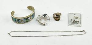 lot 100 image: Antique Gold Toned Lockets, Bracelet, and Cross from 1940s