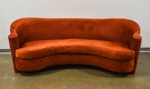 lot 28 image: Orange Curved Sofa by Carsons Furniture