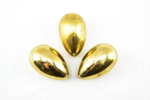 lot 289 image: Three Golden Metal Egg-Shaped Paperweights