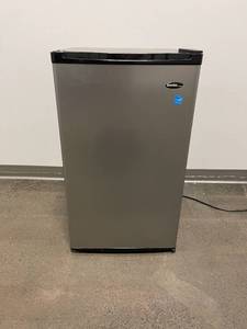 lot 59 image: New ScratchDent Mini Fridge by Danby
