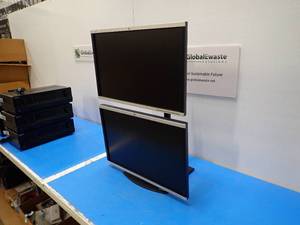 lot 4 image: Dual Monitor Stand with 2 HP LA2405x LCD Monitors  Incudes CAB-AC power cables