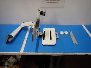 lot 12 image: Ergotron LCD wall mount with keyboard tray  to the best of our knowledge these include everything to set up, removed from an office environment 