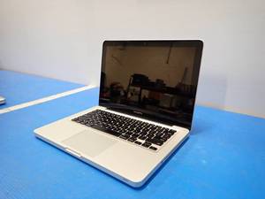 lot 71 image: Apple&nbspMacBookPro9,2 A1278 MD102LLA &nbspINTEL(R) CORE(TM) I7-3520M CPU  2.90GHZ  8GB DDR3 RAM  NO HD  13.3 screen with 1074 x 768 resolution  NO IOS or charger  Dent in the front edge 