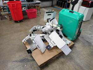 lot 74 image: Pallet of Ergotron LCD wall mounts with keyboard tray  to the best of our knowledge these include everything to set up, removed from an office environment  includes mounting accessories 
