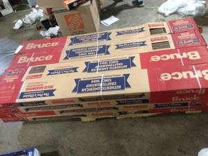lot 18 image: 16 Boxes of Bruce American Vintage Scraped Mocha 34 in. T x 5 in. W x Varying L Solid Hardwood Flooring (23.5 sqft  case)  Customer Returns See Pictures