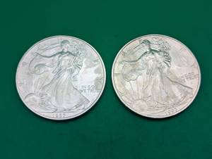Two 1997 American Eagle Silver Dollars