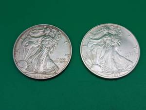 Two 1997 American Eagle Silver Dollars