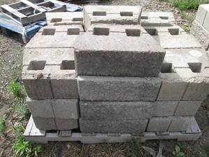 lot 123 image: Pallet of 1217 retaining wall b...