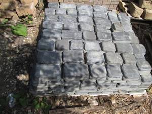 lot 188 image: Pallet of darker stone style 55,...
