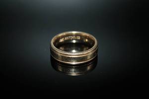 lot 4 image: 14K Gold Wedding Band