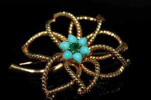 lot 14 image: 18K Gold & Gem Flower Brooch