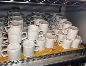 lot 93 image: Shelf of Homer Laughlin 8 oz Mugs