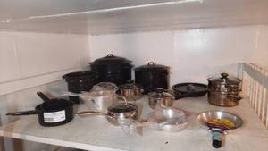 lot 149 image: Shelf of Pots and Pans