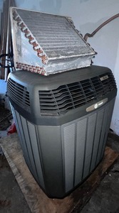 lot 9 image: Trane XL 14i 2-Ton Air Conditioner with A coil