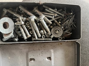lot 30 image: Small metal tool box full of new nuts and bolt  & cotter pins