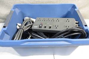 lot 19 image: Bin of Power Strips Extension Cords Surge Protectors