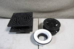 lot 51 image: Lot of 5- 4 Floor Drain Caps and Adapters