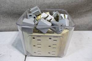 lot 55 image: Small Tote of Plug adapters and Wall Splitters